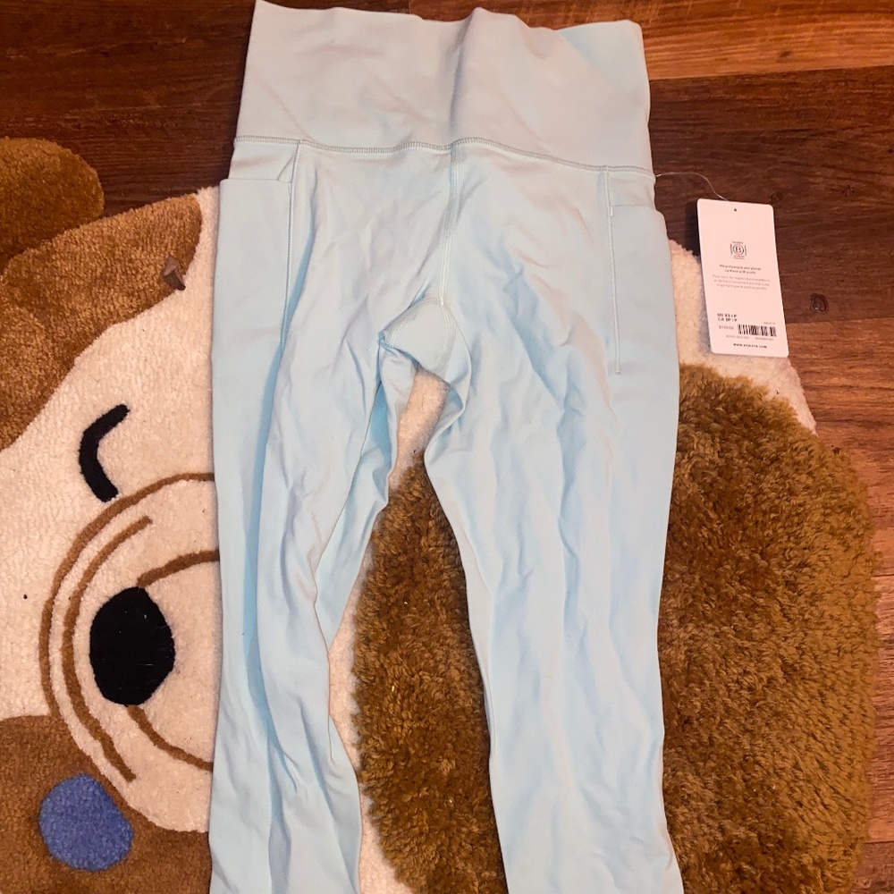 Athleta Salutation Stash 7/8 Tight NWT XS Light Blue